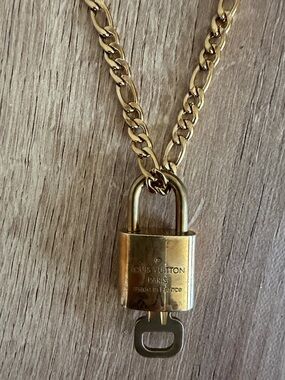 Louis Vuitton Gold-Tone Padlock Pendant with key and stainless steel necklace